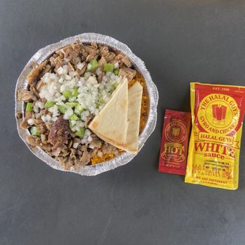 The Halal Guys - Small Platter with White Sauce Packet To-Go and Hot Sauce Packet To-G0 - Middle Eastern Near Me - Long Beach, California The Halal Guys - Small Platter with White Sauce Packet To-Go and Hot Sauce Packet To-G0 - Middle Eastern Near Me - Long Beach, California