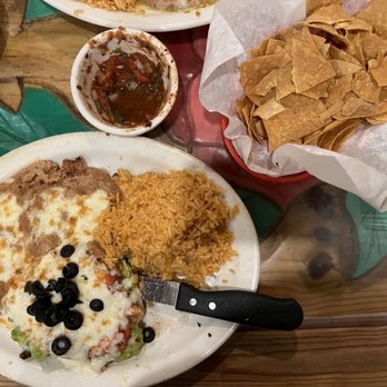 Enrique's Mexican Restaurant - chicken vera cruz: marinated charbroiled chicken topped with salsa, avocado, olives + cheese with rice and beans = $22.25 - Mexican Near Me - Long Beach, California