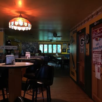 Lori's Bar & Grill - a woman sitting at a table - Bars Near Me - Oakfield, Wisconsin Lori's Bar & Grill - a woman sitting at a table - Bars Near Me - Oakfield, Wisconsin