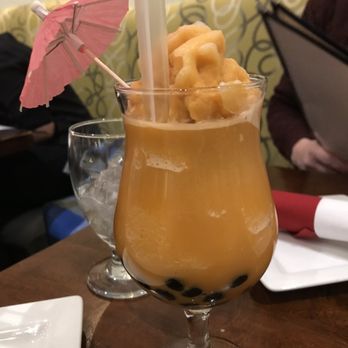 Peppermint Thai Cuisine - Mango frozen bubble tea. Note the black pearls. - Thai Near Me - Pepper Pike, Ohio