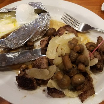 Ponderosa Steakhouse - sirloin tips with mushroom and onion. loaded baked potato on the side. - Steakhouses Near Me - Vincennes, Indiana