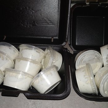 Wingstop - two open plastic containers filled with ice cream - Chicken Wings Near Me - Columbus, Ohio Wingstop - two open plastic containers filled with ice cream - Chicken Wings Near Me - Columbus, Ohio