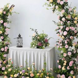 TLC Rents - Floral Wedding Arches , 4x30 Table with Skirting