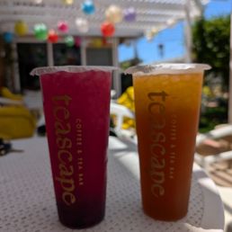 L-R: Lychee Dragon Fruit Green Tea, $6.25 prior to tax. Peach Black Tea, $5.75 prior to tax
