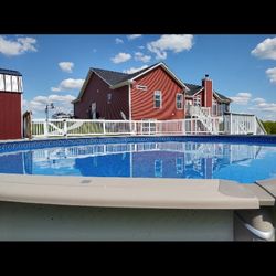 Danny Lay Painting - Golf course house. Nice white stained pool deck