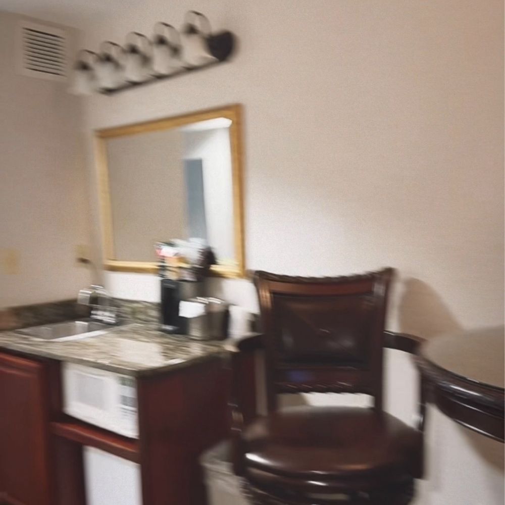 D. Hotel and Suites - The "desk" area in 2nd room - Hotels Near Me - Holyoke, Massachusetts D. Hotel and Suites - The "desk" area in 2nd room - Hotels Near Me - Holyoke, Massachusetts