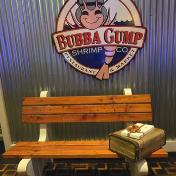 Bubba Gump Shrimp - Bubba Gump's Forrest Gump's outside bench with suitcase and a box of chocolate - Southern Near Me - Biloxi, Mississippi