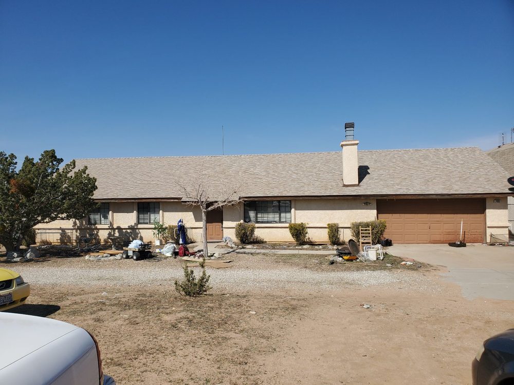 Slide of Do It All Roofing