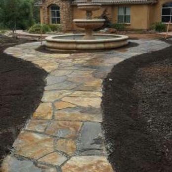 Unique Landscapes - Flag stone path - Landscaping Near Me