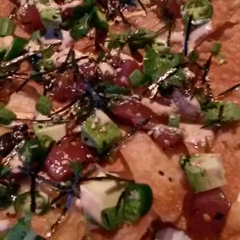 Yard House - Poke nacho.  Perfect combination of fried chip, small pieces of poke pepper and avocado, and sauces. - Bars Near Me - Raleigh, North Carolina