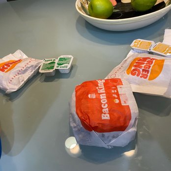 Burger King - a person sitting at a table with a bowl of fruit - Burgers Near Me - Succasunna, New Jersey