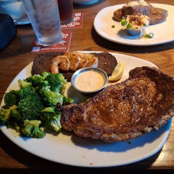 Outback Steakhouse - Rib eye steak with grilled shrimp - Steakhouses Near Me - Pompano Beach, Florida Outback Steakhouse - Rib eye steak with grilled shrimp - Steakhouses Near Me - Pompano Beach, Florida