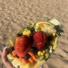Pineapple bowl with strawberry and açaí sorbet Pineapple bowl with strawberry and açaí sorbet