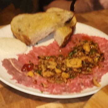 IDOL WOLF - Beef Tenderloin Carpaccio, Anchovy Lemon Caper Relish, Crispy Shallots, Cracked Pepper Aioli & Toast. - Tapas/Small Plates Near Me - Saint Louis, Missouri IDOL WOLF - Beef Tenderloin Carpaccio, Anchovy Lemon Caper Relish, Crispy Shallots, Cracked Pepper Aioli & Toast. - Tapas/Small Plates Near Me - Saint Louis, Missouri