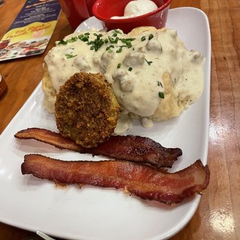 Ruby Slipper Decatur - Biscuits & Gravy with a fried green tomato and bacon! - Breakfast & Brunch Near Me - New Orleans, Louisiana Ruby Slipper Decatur - Biscuits & Gravy with a fried green tomato and bacon! - Breakfast & Brunch Near Me - New Orleans, Louisiana