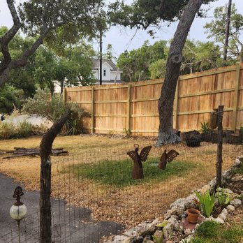 Elite Fence Company - a fenced yard with a car parked in the driveway - General Contractors Near Me - Austin, Texas Elite Fence Company - a fenced yard with a car parked in the driveway - General Contractors Near Me - Austin, Texas