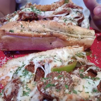 Italianos NY Pizza - Sausage and peppers Sub - Pizza Near Me - Deltona, Florida Italianos NY Pizza - Sausage and peppers Sub - Pizza Near Me - Deltona, Florida
