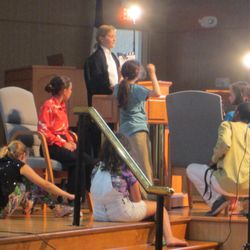 Rehoboth Summer Children's Theatre - Film Campers on location setting a shot.