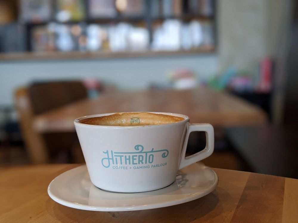 Hitherto Coffee and Gaming Parlour Logo