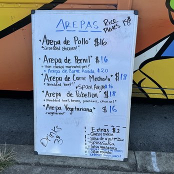 Ariannas Arepas - a sign on the sidewalk - Food Trucks Near Me - Honolulu , Hawaii