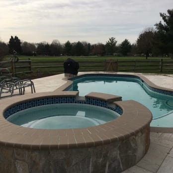 NRC Landscape Construction - Our stone pool deck is absolutely beautiful! - Masonry/Concrete Near Me - McLean, Virginia NRC Landscape Construction - Our stone pool deck is absolutely beautiful! - Masonry/Concrete Near Me - McLean, Virginia