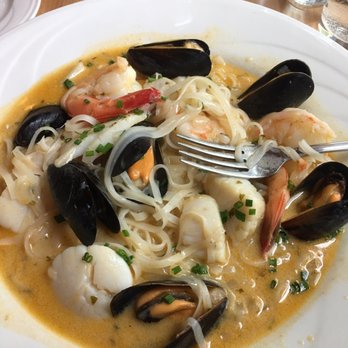 Shade - Seafood in a curry coconut sauce...lovely - Seafood Near Me - Scarborough, Maine Shade - Seafood in a curry coconut sauce...lovely - Seafood Near Me - Scarborough, Maine