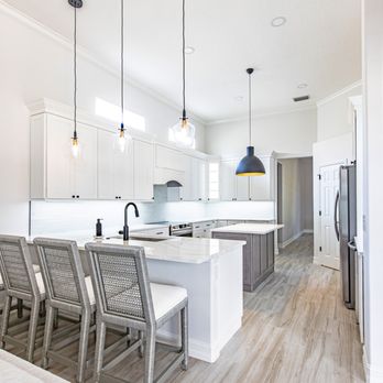 Royal Remodeling & Design - a large kitchen with island seating - Kitchen & Bath Near Me - Sarasota, Florida Royal Remodeling & Design - a large kitchen with island seating - Kitchen & Bath Near Me - Sarasota, Florida