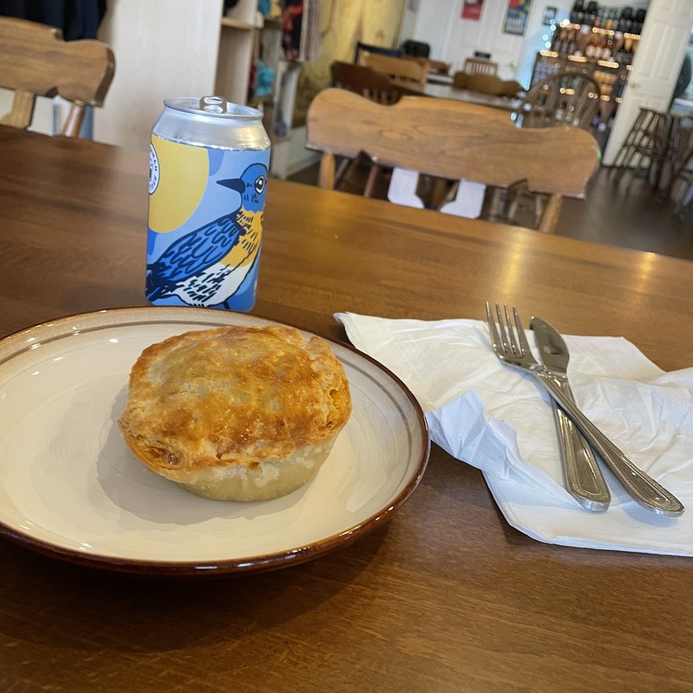 a plate of food and a drink a plate of food and a drink
