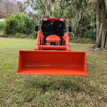 Bailey Precision Grading - the front end of a bobcat - Landscaping Near Me