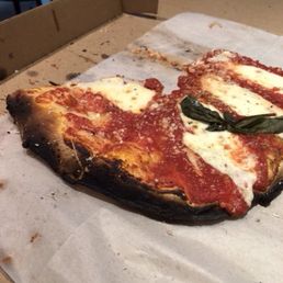 One pice of basil on The Square Margherita 12".  Tried to eat it.  Went into the trash instead.  Nasty...