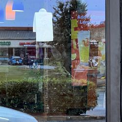Popeyes Louisiana Kitchen - Middle of the day... store full of workers and drive thru closed