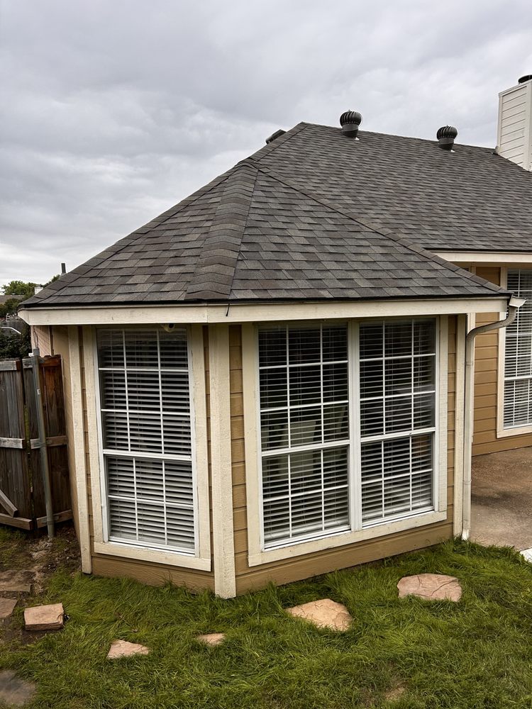 Slide of Homer’s Roofing & Construction