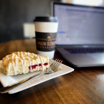 Main Street Roasters - White chocolate raspberry scone and a vanilla chai latte. So good. - Coffee & Tea Near Me - Nappanee, Indiana Main Street Roasters - White chocolate raspberry scone and a vanilla chai latte. So good. - Coffee & Tea Near Me - Nappanee, Indiana