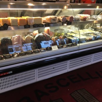 Frascellis Pizza - a deli case filled with different types of cheese - Pizza Near Me - Buckner, Kentucky
