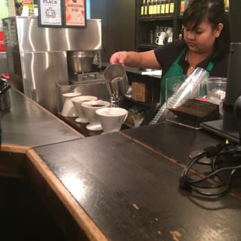 Starbucks - Barista making a pour over of pike place reserve - Coffee & Tea Near Me - Seattle, Washington