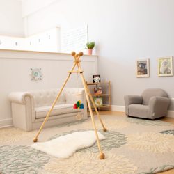 Lily Montessori Parent Child Classes - Toddler reading area and baby mobile stand!