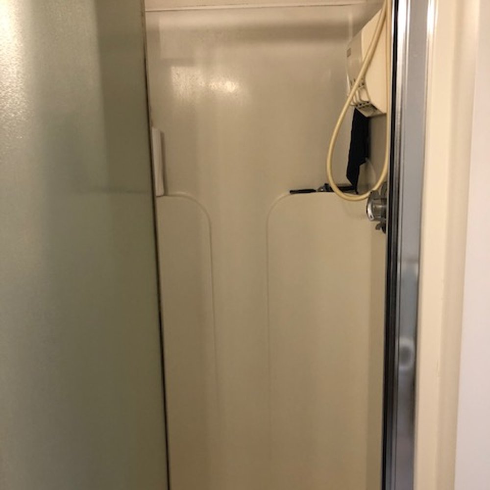 Designworks Company - Before: tiny fiberglass shower. - General Contractors Near Me - Waltham, Massachusetts Designworks Company - Before: tiny fiberglass shower. - General Contractors Near Me - Waltham, Massachusetts