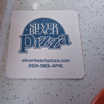 Silver Beach Pizza - Coaster at the table - Pizza Near Me - Saint Joseph, Michigan Silver Beach Pizza - Coaster at the table - Pizza Near Me - Saint Joseph, Michigan