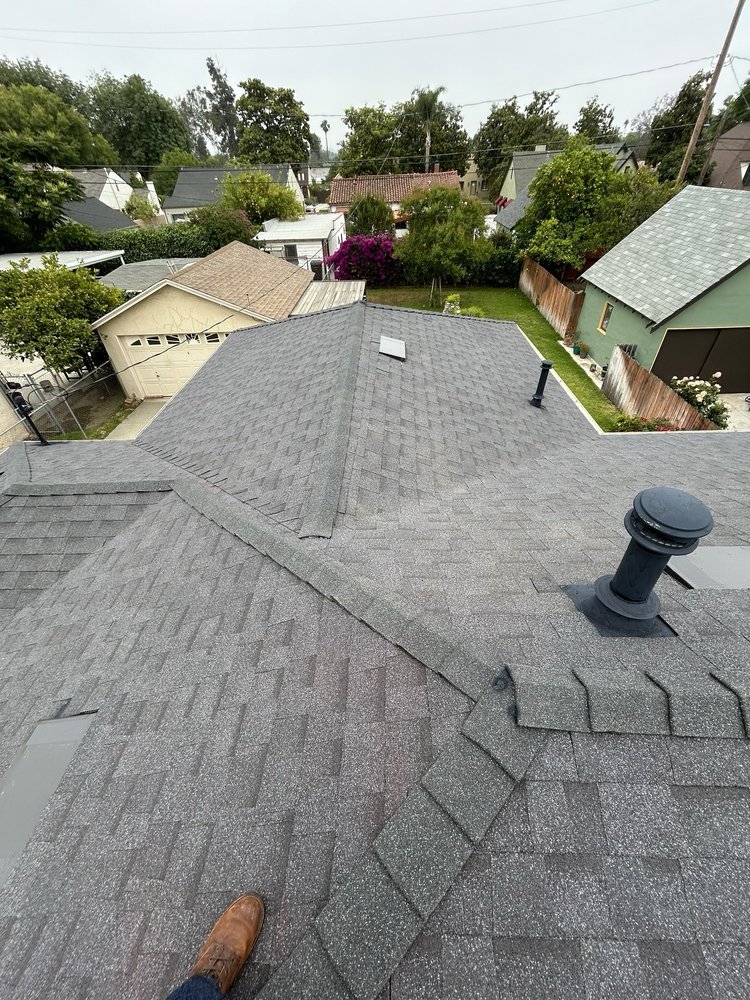 Slide of Manna Roofing Company