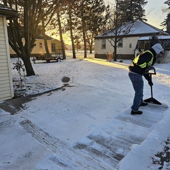 A1 Lawn, Snow & Tree Service LLC - Hibbing, MN - a man using a snow shovel - Snow Removal Near Me - Hibbing, Minnesota A1 Lawn, Snow & Tree Service LLC - Hibbing, MN - a man using a snow shovel - Snow Removal Near Me - Hibbing, Minnesota