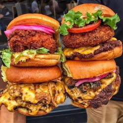 Sports Deli - Stacked crispy chicken and cheesy beef burgers. Cheese Fries