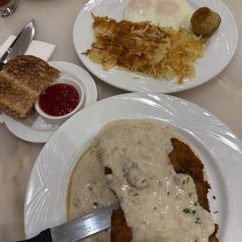 Café Milano - The chicken Fried steak takes up the whole plate, which was a large plate requiring a second plate for the eggs and potatoes. - American Near Me - Reno, Nevada