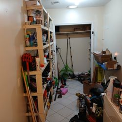 Sun Coast General Property Services - Helped a customer organize his storage/laundry room. Before pic