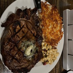 14oz ribeye with hash browns and fire-roasted corn 14oz ribeye with hash browns and fire-roasted corn