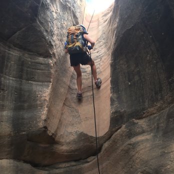 Southern UT Guiding - Sara descending on one of the rappelling trips - Rock Climbing Near Me - Hurricane, Utah Southern UT Guiding - Sara descending on one of the rappelling trips - Rock Climbing Near Me - Hurricane, Utah