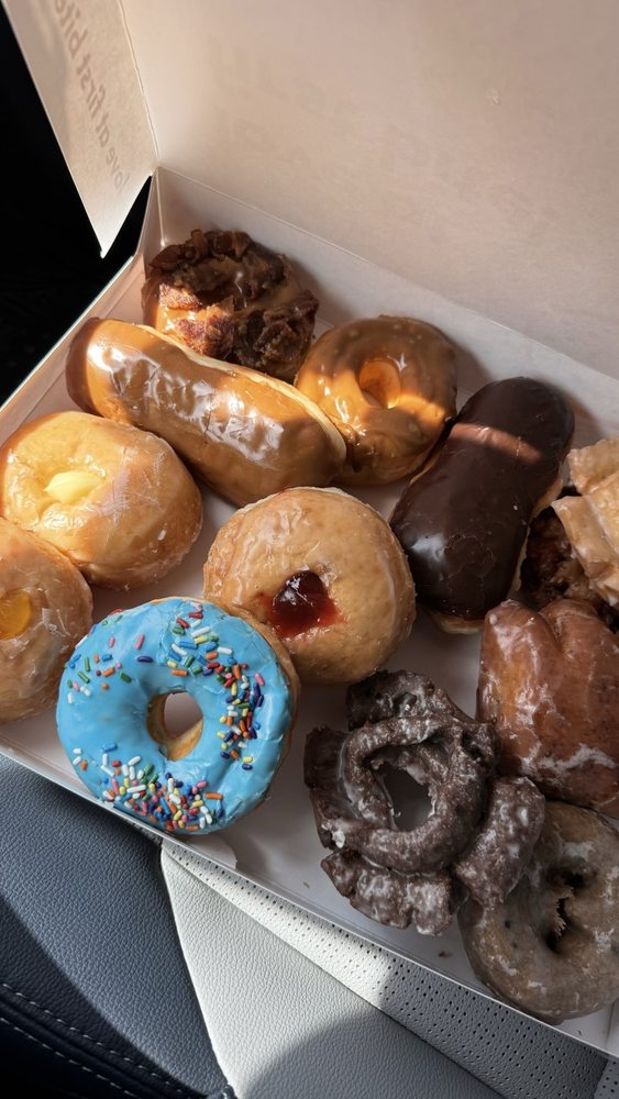 Fluffy Kolaches and Donuts Logo
