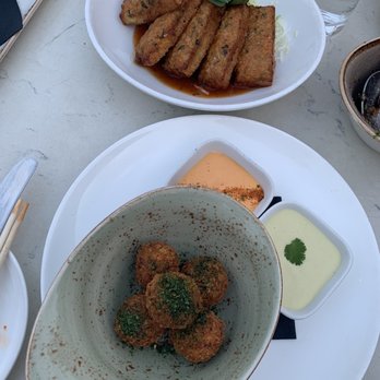 The Peached Tortilla - Kimchi Arancini Balls $8 and Mom 's Toast $9 - SO good. Wanted to dip everything in the sriracha aioli - Asian Fusion Near Me - Austin, Texas The Peached Tortilla - Kimchi Arancini Balls $8 and Mom 's Toast $9 - SO good. Wanted to dip everything in the sriracha aioli - Asian Fusion Near Me - Austin, Texas