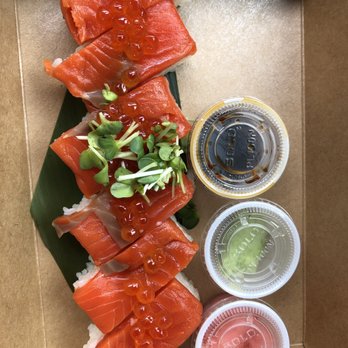 Yoroshiku - Pressed Salmon sushi - the salmon roe makes this extra yummy. Great portion for $14. - Ramen Near Me - Seattle, Washington Yoroshiku - Pressed Salmon sushi - the salmon roe makes this extra yummy. Great portion for $14. - Ramen Near Me - Seattle, Washington