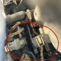 Angels Diesel & Automotive Mobile Repair - Broken heater hose from top of engine bay.