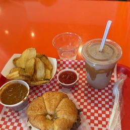 Croissant Double Cheeseburger, Fries, Chili Cheese side, and Shake. Croissant Double Cheeseburger, Fries, Chili Cheese side, and Shake.